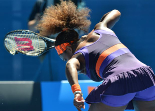 Serena Williams smashes racquet